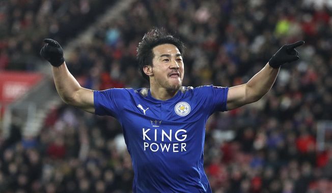 Leicester City&#x27;s Shinji Okazaki celebrates scoring his side&#x27;s fourth goal of the game,  during the English Premier League soccer match between Southampton and Leicester City at St Mary&#x27;s Stadium, in Southampton, England, Wednesday, Dec. 13, 2017.  (Adam Davy/PA via AP)