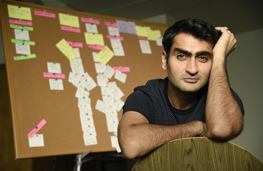 In this Nov. 21, 2017 photo, actor-comedian Kumail Nanjiani, co-writer and star of the film "The Big Sick," poses for a portrait in front of a billboard of script notecards at his home in Los Angeles. Nanjiani was named as one of 2017's breakthrough entertainers by the Associated Press. (Photo by Chris Pizzello/Invision/AP)