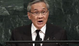FILE - IN this Friday, Sept. 22, 2017, file photo, Foreign Minister Don Pramudwinai of Thailand addresses the United Nations General Assembly, at U.N. headquarters. On behalf of the Thailand’s military junta on Tuesday, Foreign Minister Don welcomed the European Union’s decision to ease political sanctions imposed against it for overthrowing an elected government in 2014. (AP Photo/Richard Drew, FIle)