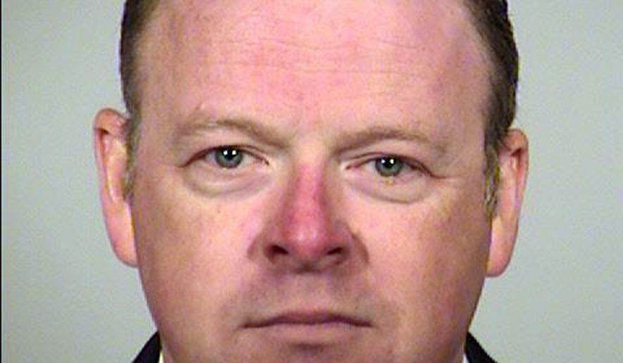 This undated photo provided by the Multnomah County Sheriff's office shows Christian Berge. On Thursday Dec.14, 2017, Berge resigned as a Portland Police officer and pled guilty in Portland, Ore., to one count of first-degree official misconduct and was sentenced to 18 months of probation with 120 hours of community service. (Multnomah County Sheriff's Office via AP)