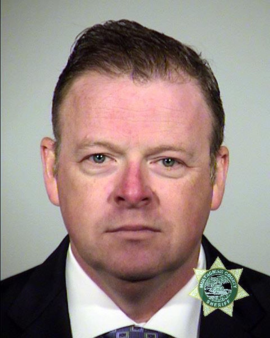 This undated photo provided by the Multnomah County Sheriff's office shows Christian Berge. On Thursday Dec.14, 2017, Berge resigned as a Portland Police officer and pled guilty in Portland, Ore., to one count of first-degree official misconduct and was sentenced to 18 months of probation with 120 hours of community service. (Multnomah County Sheriff's Office via AP)