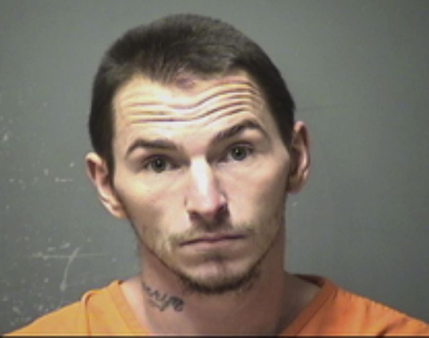 This booking photo released Wednesday, Dec. 13, 2017 by the Manchester Police Department shows Mark Heath, 32, arrested on second-degree murder charges in the death of a 2-year-old Jacob Pelletier, who died of blunt force trauma to the abdomen on Monday in Manchester, N.H. (Manchester Police Department via AP)