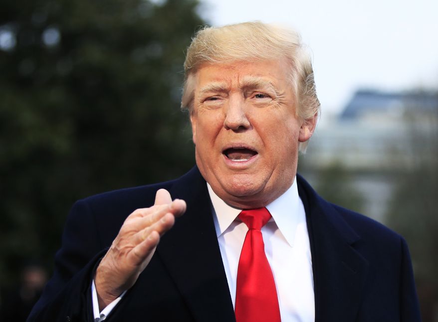 President Donald Trump speaks to reporters before leaving the White House in Washington, Friday, Dec. 15, 2017, for a trip to Quantico, Va., to attend the FBI National Academy graduation ceremony. (AP Photo/Manuel Balce Ceneta)