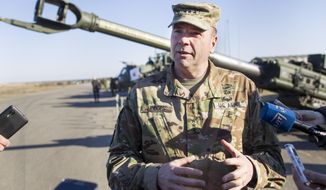 In this March 24, 2016, file photo Commander of U.S. Army Europe Lt. Gen. Ben Hodges speaks to the media during the joint NATO military exercise at the Rukla military base some 120 km. (75 miles) west of the capital Vilnius, Lithuania. Hodges will is retiring.  (AP Photo/Mindaugas Kulbis, file)