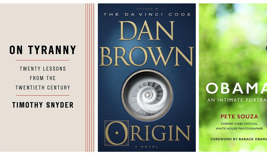 This combination photo shows popular books released in 2017, from left, "Grant," a biography by Ron Chernow, released by Penguin Press, "On Tyranny: Twenty Lessons from the Twentieth Century," by Timothy Snyder, released by Tim Duggan Books, "Origin," a novel by Dan Brown, released by Doubleday and "Obama: An Intimate Portrait," by Pete Souza, released by Little, Brown and Company. (Penguin Press/Tim Duggan Books/Doubleday/Little Brown via AP)