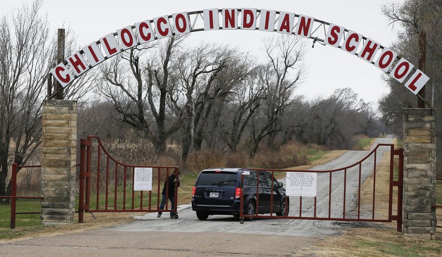 FILE - In this Wednesday, Nov. 29, 2017 file photo, a vehicle arrives at the abandoned Chilocco Indian School campus in Newkirk, Okla, Five American Indian tribes are opposing plans by the U.S. Department of Homeland Security to conduct bioterrorism drills at a tribal burial ground and abandoned boarding school, saying the agency didn't tell them that "potentially dangerous substances" could be used there. (AP Photo/Sue Ogrocki, File)