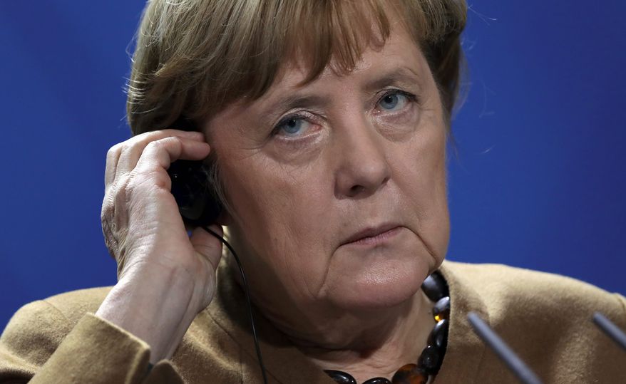 German Chancellor Angela Merkel&#x27;s proposed coalition government could boost conservatives and far-right populists in the long run. (Associated Press/File)