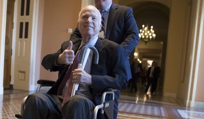 Sen. John McCain, R-Ariz., leaves a closed-door session where Republican senators met on the GOP effort to overhaul the tax code, on Capitol Hill in Washington. (AP Photo/J. Scott Applewhite, File)