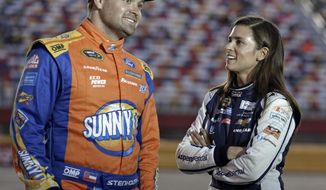 FILE - In this Oct. 6, 2016, file photo, Danica Patrick, right, talks with Ricky Stenhouse Jr, before qualifying for Saturday&#39;s NASCAR Sprint Cup series auto race at Charlotte Motor Speedway in Charlotte, N.C. Danica Patrick and Ricky Stenhouse Jr. have ended their nearly five-year relationship. A spokeswoman for Patrick confirmed to The Associated Press on Monday, Dec. 18, 2017,  that the race car drivers &amp;quot;are no longer in a relationship.&amp;quot; (AP Photo/Chuck Burton, File)