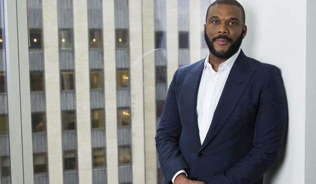 In this Nov. 16, 2017 photo, actor-filmmaker and author Tyler Perry poses for a portrait in New York to promote his book, "Higher Is Waiting." (Photo by Amy Sussman/Invision/AP)