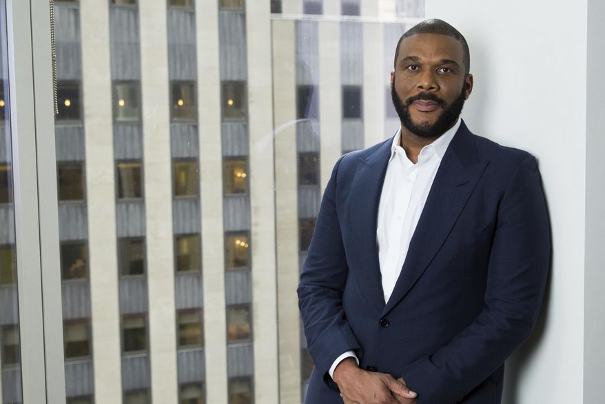 In this Nov. 16, 2017 photo, actor-filmmaker and author Tyler Perry poses for a portrait in New York to promote his book, "Higher Is Waiting." (Photo by Amy Sussman/Invision/AP)