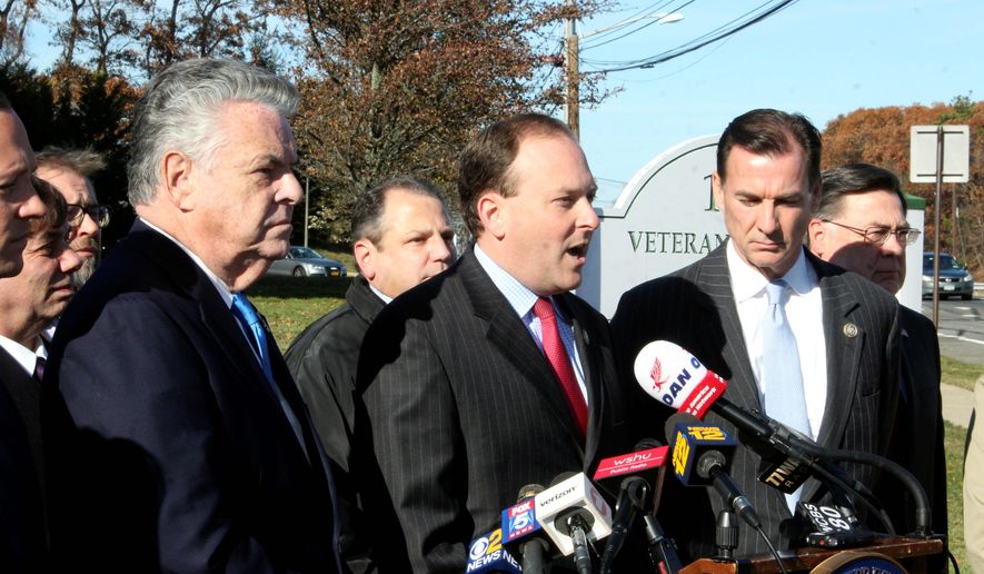 Republican Reps. Peter King, left, and Lee Zeldin, center, join Democratic Rep. Tom Suozzi, right, at a press conference with local elected officials and business leaders, Tuesday, Nov. 28, 2017, in Hauppauge, N.Y. (AP Photo/Frank Eltman) ** FILE **