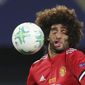 FILE - Manchester United&#39;s Marouane Fellaini heads the ball during the UEFA Super Cup final soccer match between Real Madrid and Manchester United at Philip II Arena in Skopje, on Aug. 8, 2017. (AP Photo/Boris Grdanoski)