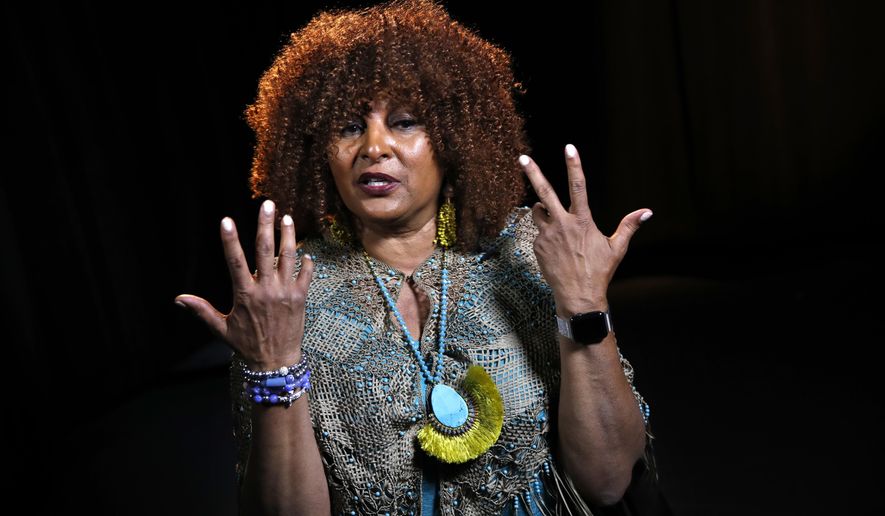 FILE - This file photo taken Aug. 25, 2017, shows actress Pam Grier during an interview in Washington. Grier, the star of gritty 1970s Blaxploitation movies like "Foxy Brown" and "Coffy," is scheduled to be a guest at the 2018 Las Cruces International Film Festival. Grier will join Cybill Shepherd, star of the television series "Moonlighting," at the film festival which begins March 7, 2018. (AP Photo/Jacquelyn Martin,File)