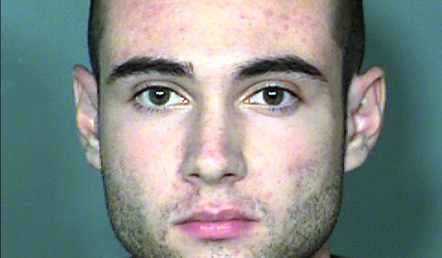 FILE - This July 24, 2015 booking file photo provided by Clark County Detention Center shows Joshua Honea, of Las Vegas. A jury in Nevada convicted the former Las Vegas police Explorer of one charge of child sexual assault but acquitted him of 51 other charges in a case involving a relationship with a girl who was under 16. Honea could face life in prison on the felony conviction, but a Clark County District Court judge said Monday, Dec. 18, 2017 that he can remain free on $250,000 bail pending sentencing April 16. (Clark County Detention Center via AP, File)