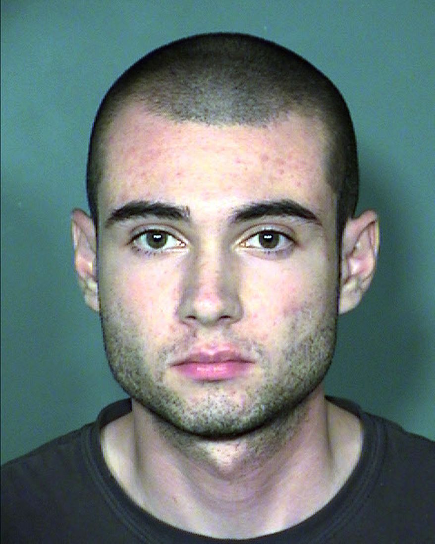FILE - This July 24, 2015 booking file photo provided by Clark County Detention Center shows Joshua Honea, of Las Vegas. A jury in Nevada convicted the former Las Vegas police Explorer of one charge of child sexual assault but acquitted him of 51 other charges in a case involving a relationship with a girl who was under 16. Honea could face life in prison on the felony conviction, but a Clark County District Court judge said Monday, Dec. 18, 2017 that he can remain free on $250,000 bail pending sentencing April 16. (Clark County Detention Center via AP, File)