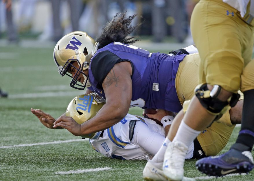 In this Oct. 28, 2017, file photo, Washington&#x27;s Vita Vea sacks UCLA quarterback Josh Rosen in the first half of an NCAA college football game, in Seattle. Vea&#x27;s impact on the game was enough that coaches voted the Washington defensive tackle the Pac-12 defensive player of the year. He&#x27;s got likely one more game for the Huskies in the Fiesta Bowl against Penn State. (AP Photo/Elaine Thompson) ** FILE **