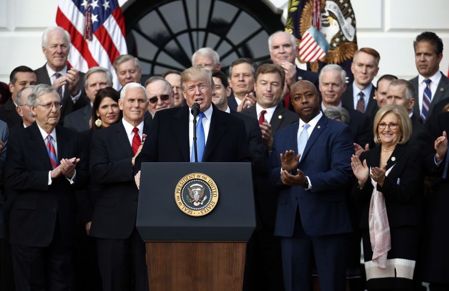 President Donald Trump speaks during a bill passage event on the South Lawn of the White House in Washington, Wednesday, Dec. 20, 2017, to acknowledge the final passage of tax overhaul legislation by congress. (AP Photo/Carolyn Kaster)
