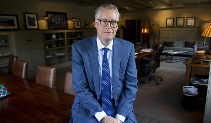 FILE - In this May 12, 2016 file photo, Delta Air Lines CEO Ed Bastian poses for a portrait in his office at the company's headquarters in Atlanta. Bastian says the company will seek compensation for its losses after a power outage knocked out the Atlanta airport's power supply and also its backup electricity for about 11 hours Sunday, Dec. 17, 2017. The blackout stranded thousands of passengers and led to the cancellation of more than 1,500 flights just ahead of the frenzied holiday travel period. (AP Photo/John Bazemore, File)
