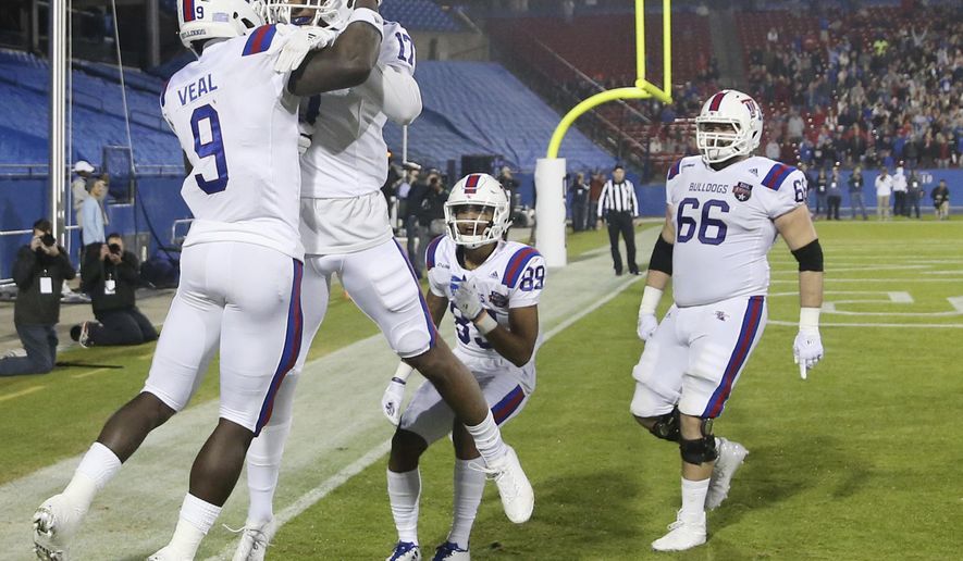 Louisiana Tech wide receiver Teddy Veal (9) celebrates his touchdown reception against Louisiana Tech during the first quarter of the Frisco Bowl NCAA college football game Wednesday, Dec. 20, 2017, in Frisco, Texas. (Andy Jacobsohn/The Dallas Morning News via AP)