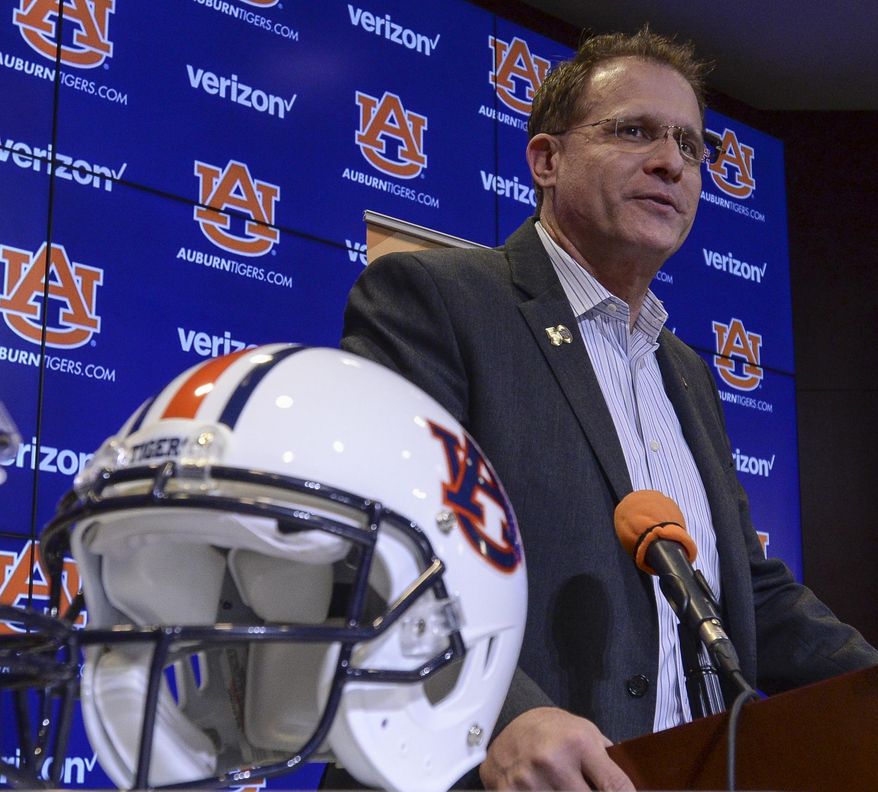 Auburn head coach Gus Malzahn speaks Wednesday, Dec. 13, 2017, during a Peach Bowl press conference in Auburn, Ala. No. 7 Auburn will play undefeated UCF in the 50th Anniversary Chick-fil-A Peach Bowl on Jan. 1, 2018. (Julie Bennett/AL.com via AP