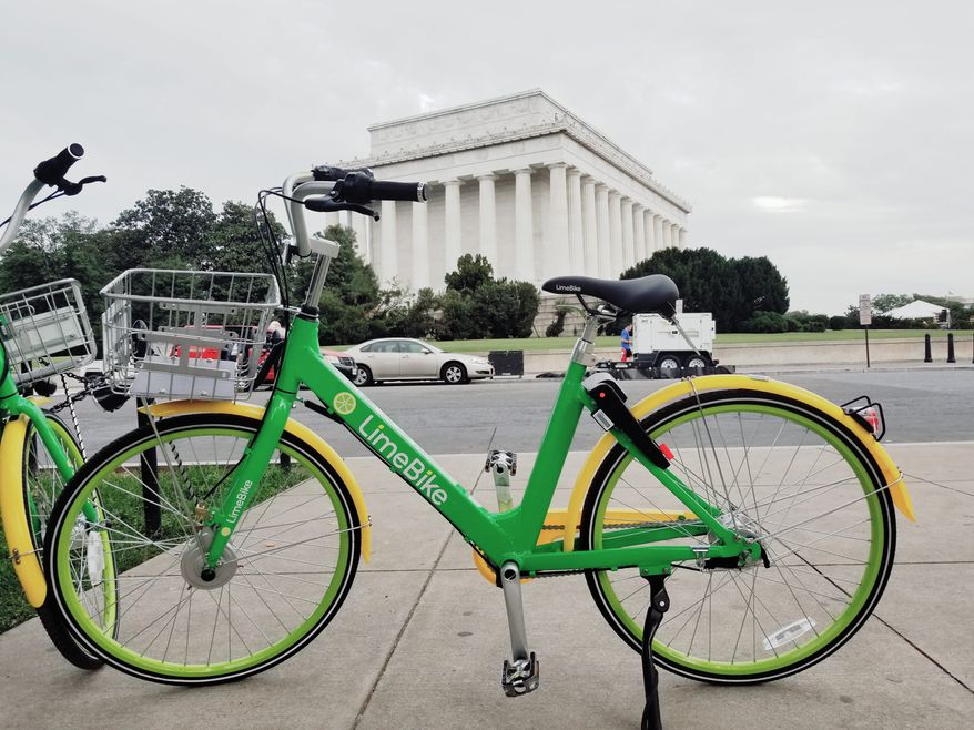 LimeBike of San Mateo, California, is one of four dockless bike-sharing firms the District Department of Transportation is hosting in a seven-month pilot program. Dockless bikes do not need to chained or parked in a specific location. They use a self-locking mechanism that can be accessed by a smartphone app. (Julia Airey/The Washington Times)
