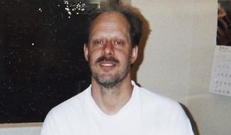 FILE - This undated photo provided by Eric Paddock shows his brother, Las Vegas gunman Stephen Paddock. On Sunday, Oct. 1, 2017, Stephen Paddock opened fire on the Route 91 Harvest festival killing dozens and wounding hundreds. Clark County Coroner John Fudenberg told The Associated Press on Thursday, Dec. 21, that Paddock, died of a self-inflicted gunshot to the mouth, and that was Paddock&#39;s only wound. His death was ruled a suicide. (Courtesy of Eric Paddock via AP, File)
