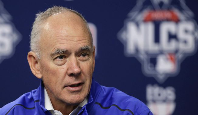 FILE - In this Oct. 16, 2015 file photo, New York Mets general manager Sandy Alderson answers questions for the media during a news conference in New York. Alderson has been given a contract extension, as long expected. Alderson succeeded Omar Minaya in October 2010, and his previous contract expired after the season. The length of his new deal was not specified. New York reached the World Series in 2015 and the NL wild-card game the following year before slumping to a 70-92 record in an injury-filled 2017 season. (AP Photo/Julie Jacobson, File)