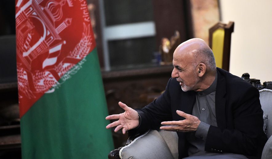 Afghan President Ashraf Ghani talks with U.S. Vice President Mike Pence at the President Palace in Kabul, Afghanistan, on Thursday, Dec. 21, 2017. (Mandel Ngan/Pool via AP)
