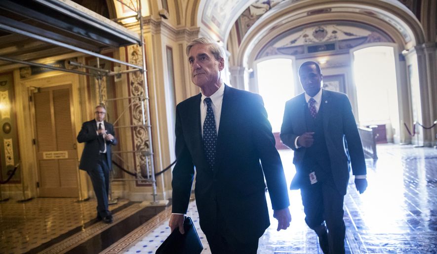 Special Counsel Robert Mueller departs the Capitol after a closed-door meeting with members of the Senate Judiciary Committee about Russian meddling in the election and possible connection to the Trump campaign, in Washington. (AP Photo/J. Scott Applewhite)