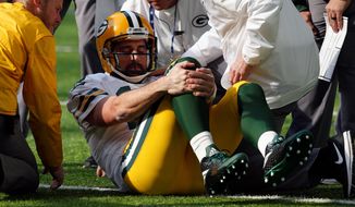 Green Bay Packers quarterback Aaron Rodgers was one of the marquee players who got injured this season, which media analysts say might have hurt TV ratings. (Associated Press/File)