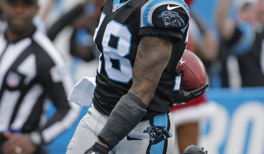 Carolina Panthers' Damiere Byrd (18) celebrates his kickoff return for a touchdown against the Tampa Bay Buccaneers during the first half of an NFL football game in Charlotte, N.C., Sunday, Dec. 24, 2017. (AP Photo/Bob Leverone)