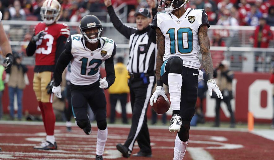 Jacksonville Jaguars wide receiver Jaelen Strong celebrates after scoring a touchdown against the San Francisco 49ers during the first half of an NFL football game in Santa Clara, Calif., Sunday, Dec. 24, 2017. (AP Photo/Tony Avelar)