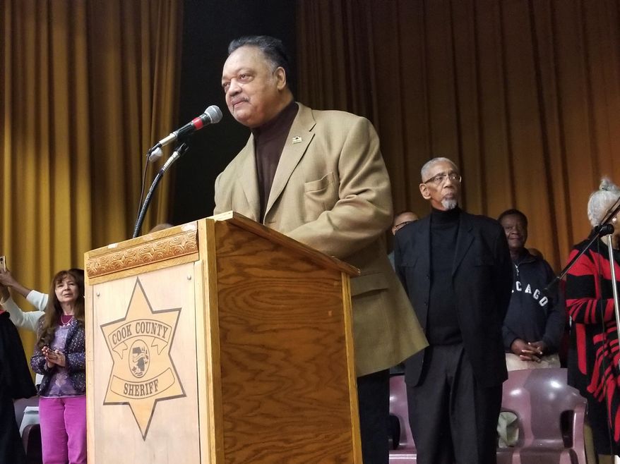 The Rev. Jesse Jackson addresses inmates at Cook County Jail during a Christmas Day sermon on Monday, Dec. 25, 2017, in Chicago. Jackson disclosed a 2015 diagnosis of Parkinson’s disease last month. The 76-year-old said he’s trying to manage progression of the disease with daily medication, physical therapy and prayer. (AP Photo/Sophia Tareen)