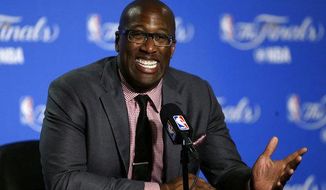 FILE - In this June 1, 2017, file photo, Golden State Warriors interim head coach Mike Brown answers questions during a news conference after Game 1 of basketball&#39;s NBA Finals against the Cleveland Cavaliers in Oakland, Calif. Brown has a do-for-others nature and as the Warriors host Cleveland on Christmas Day everyone will remember exactly what he did to help guide Golden State to a second title in three years last June as he filled in for ailing head coach Steve Kerr. (AP Photo/Ben Margot, File)