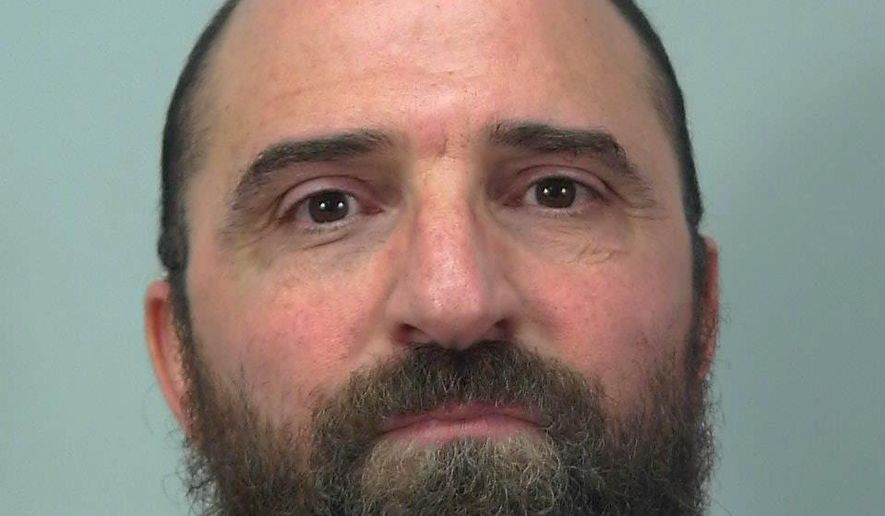 Khaled Shabani is shown in a Dec. 22, 2017 photo provided by the Dane County (Wis.) Sheriff's Office. Madison police say they arrested Shabani accused of snipping a 22-year-old customer's ear on Friday, Dec. 22, 2017. Police spokesman Joel DeSpain says officers arrested 46-year-old Shabani on suspicion of mayhem and disorderly conduct while armed. DeSpain says Shabani told officers it was an accident. (Dane County (Wis.) Sheriff's Office via AP)