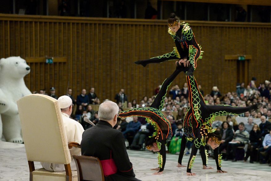 Artists of the Golden Circus perform in front of Pope Francis during his weekly general audience, in the Pope Paul VI hall, at the Vatican, Wednesday, Dec. 27, 2017 (L'Osservatore Romano/Pool Photo via AP)