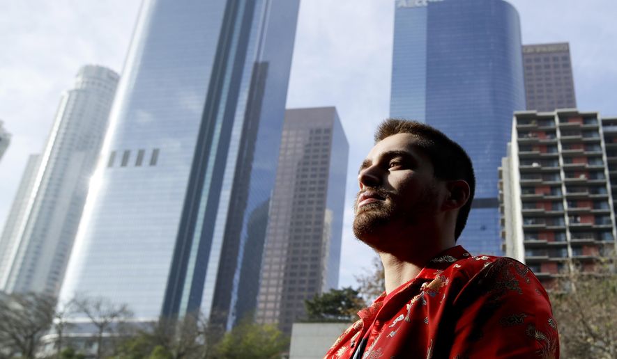 In this Tuesday, Dec. 26, 2017 photo, Elias Zaldivar, who has a medical marijuana prescription poses for a picture in Los Angeles. In the two decades since the state approved medical marijuana, it was an open secret that if someone was 18, they wouldn’t have to look very hard to find a doctor to write a prescription for a real or imagined health issue requiring marijuana. Now, with weed becoming legal for recreational use, that charade will end for many, and the medical marijuana industry could take a major revenue hit. (AP Photo/Chris Carlson)
