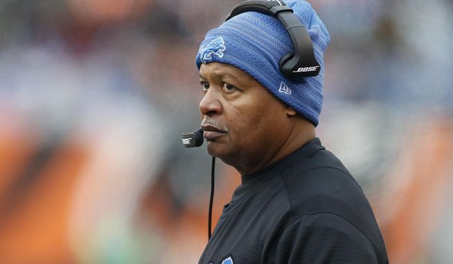 File- This Dec. 24, 2017, file photo shows Detroit Lions head coach Jim Caldwell watching during the first half of an NFL football game against the Cincinnati Bengals in Cincinnati.  The Packers (7-8) have fallen short of the playoffs for the first time since 2008, a year before Matthews was drafted. Detroit (8-7) won’t be in the postseason either, and the big question now is whether the Lions will stick with Caldwell for another year. Detroit made the playoffs last season but lost its final three regular-season games and its postseason opener. This year, the Lions were in decent shape at 6-4 before consecutive losses against Minnesota and Baltimore left them playing catch-up.(AP Photo/Gary Landers, File)