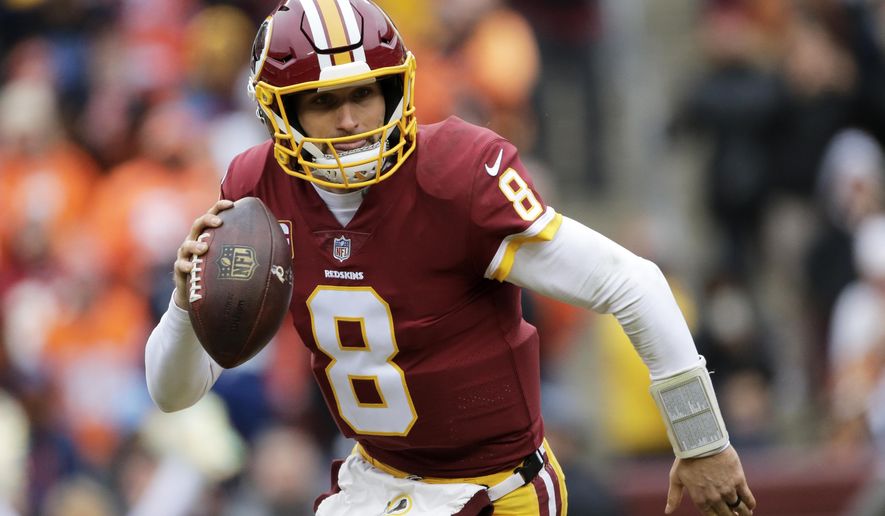 File- This Dec. 24, 2017, file photo shows Washington Redskins quarterback Kirk Cousins scrambling during an NFL football game in Landover, Md. Cousins will make his 48th consecutive start for the Redskins. It could be his last depending on which path his seemingly never-ending free agent saga takes this off-season.  (AP Photo/Mark Tenally, File)