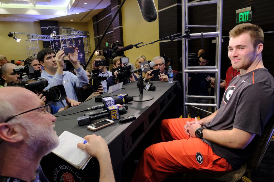 Georgia quarterback Jake Fromm answers questions from reporters during a news conference in Los Angeles on Thursday, Dec. 28, 2017. Georgia will take on Oklahoma on Monday, Jan. 1, 2018. (AP Photo/Richard Vogel)