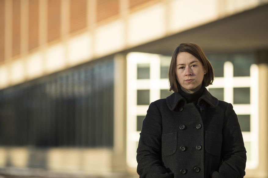 In this Sunday, Dec. 17, 2017, photo, Professor Celeste Kidd is photographed at University of Rochester, in Rochester, N.Y. When Kidd was a graduate student at the University of Rochester she says a professor supervising her made her life unbearable by stalking her, making demeaning comments about her weight and talking about sex. Ten years on and now a professor of neuroscience at the university, Kidd is taking legal action. She has filed a federal lawsuit against the school alleging that it mishandled its sexual harassment investigation into the professor’s actions and then retaliated against her and her colleagues for reporting the misconduct. (AP Photo/Brett Carlsen)