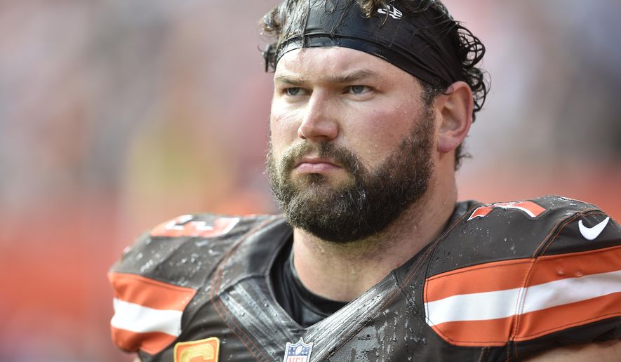 This Oct. 22, 2017, file photo shows Cleveland Browns offensive tackle Joe Thomas walking on the sideline during an NFL football game against the Tennessee Titans, in Cleveland. (AP Photo/David Richard, File)