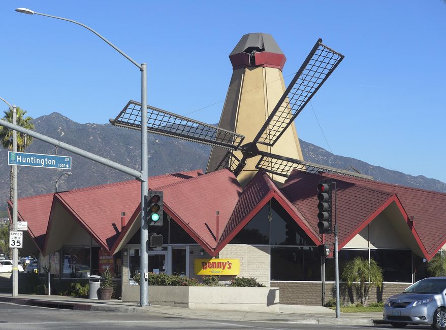 The windmill on Denny's restaurant collapsed and fell on the roof of the restaurant Friday, Dec. 29, 2017, in Arcadia, Calif. No injuries were reported after the windmill fell Friday morning. It’s not clear how much damage occurred inside, but the restaurant in Arcadia was shut down for maintenance at noon with no word on when it would reopen. (Walt Mancini/Los Angeles Daily News via AP)