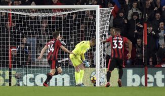 AFC Bournemouth&#39;s Ryan Fraser, left, celebrates scoring his side&#39;s second goal of the game against Everton during the English Premier League soccer match against Everton at the Vitality Stadium, Bournemouth, England, Saturday Dec. 30, 2017. (Simon Galloway/PA via AP)