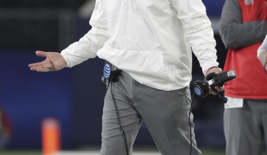 Ohio State coach Urban Meyer yells from the sideline during the first half of the team's Cotton Bowl NCAA college football game against Southern California in Arlington, Texas, Friday, Dec. 29, 2017. (AP Photo/LM Otero)