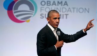 &quot;One of the dangers of the internet is that people can have entirely different realities. They can be cocooned in information that reinforces their current biases,&quot; said former President Barack Obama. He said that leaders should use the internet responsibly. (Associated Press)