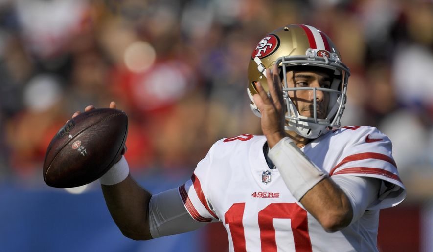 San Francisco 49ers quarterback Jimmy Garoppolo passes against the Los Angeles Rams during the first half of an NFL football game, Sunday, Dec. 31, 2017, in Los Angeles. (AP Photo/Mark J. Terrill) **FILE**