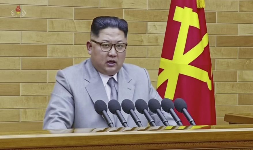 In this image made from video released by KRT on Jan. 1, 2018, North Korean leader Kim Jong Un speaks in his annual address in undisclosed location, North Korea. North Korean leader Kim said Monday, Jan. 1, 2018, the United States should be aware that his country's nuclear forces are now a reality, not a threat. But he also struck a conciliatory tone in his New Year's address, wishing success for the Winter Olympics set to begin in the South in February and suggesting the North may send a delegation to participate. (KRT via AP Video)