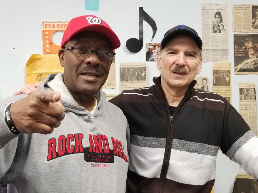 Longtime employee Warren Scooter Magruder (left) and owner Alan Lee (right) say their music will live on in their radio DJing after they close up shop. (Julia Airey/The Washington Times)
